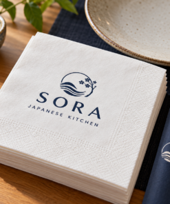 Illustrative custom restaurant branding on disposable paper napkins
