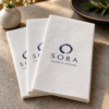 Illustrative custom restaurant branding on disposable paper napkins
