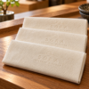 Illustrative custom restaurant branding on disposable paper napkins